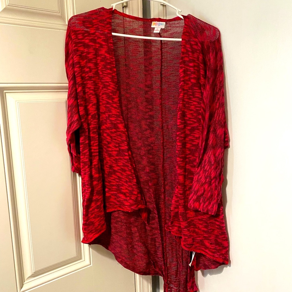 Small pink knit cardigan